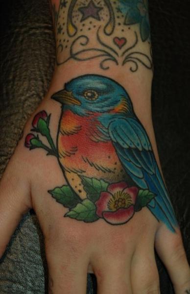 Blue Bird on Back of Hand tattoo by Three Kings Tattoo
