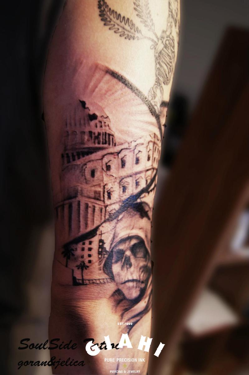 Capitol Skull in Hood Gaphic tattoo by Goran Petrovic
