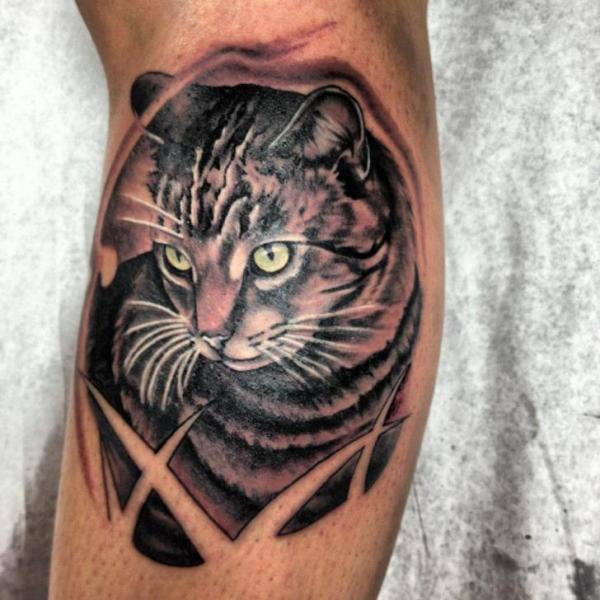 Cat in Grass Realistic tattoo by Tantrix Body Art