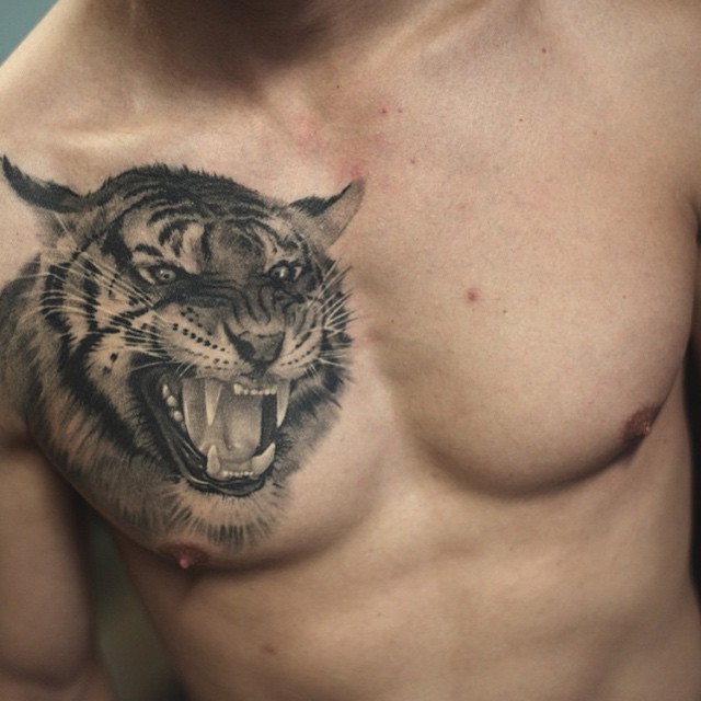 Chest Realistci Tiger tattoo by Charles Saucier