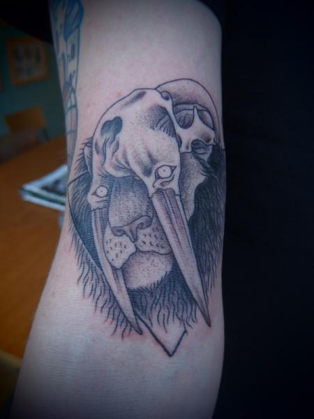 Fang Scull Lion Dotwork tattoo by Papanatos Tattoos