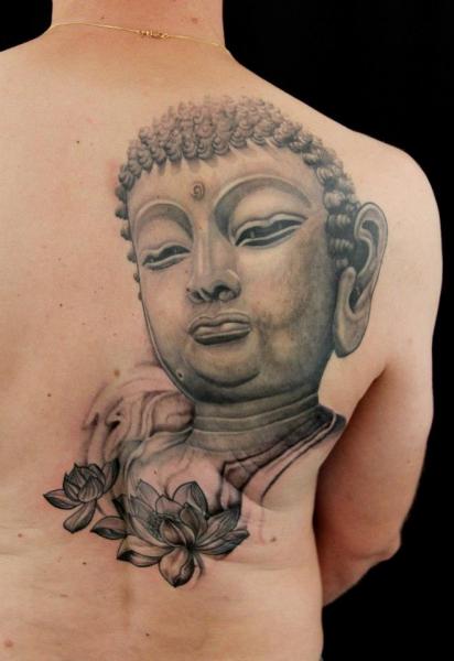 Flowers and Buddha tattoo on Blade by Skin Deep Art