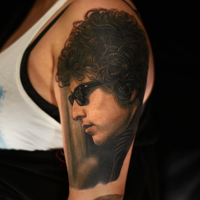 Realistic Bob Dylan tattoo by Nikko Hurtado