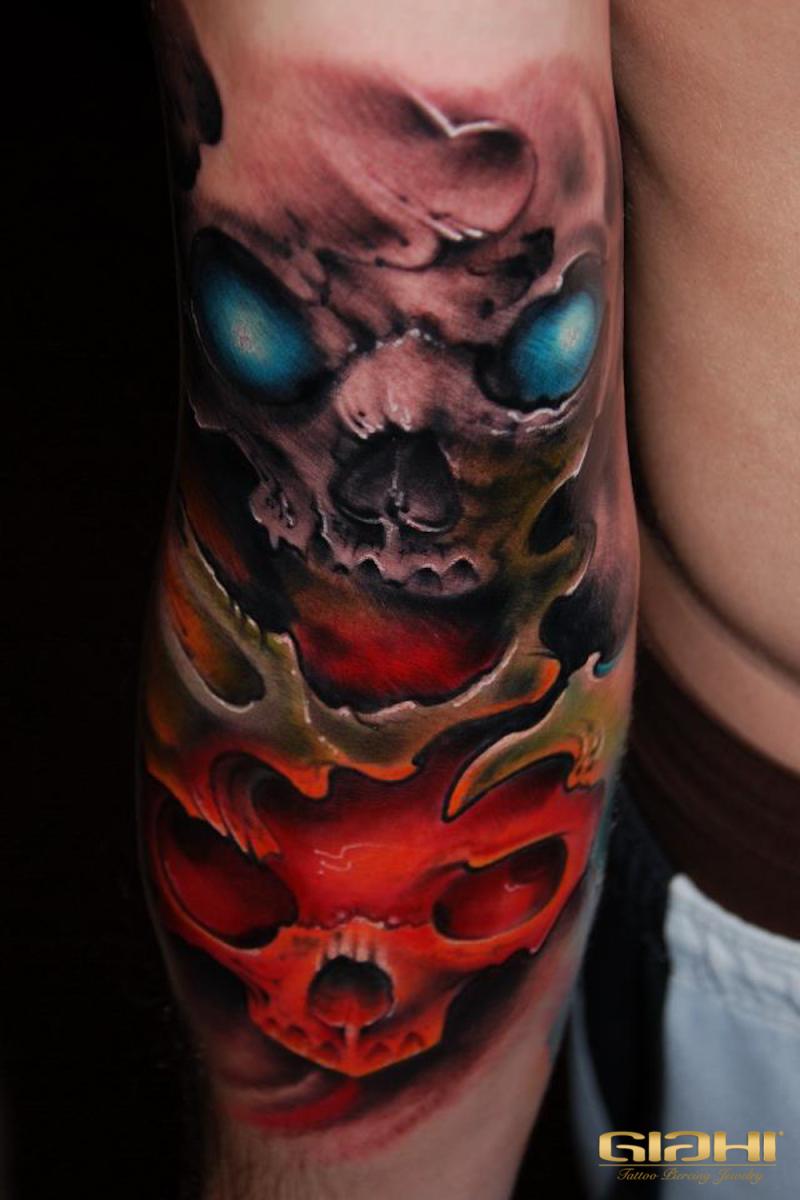 Red and Blue Eyes Skull tattoo by Szilard