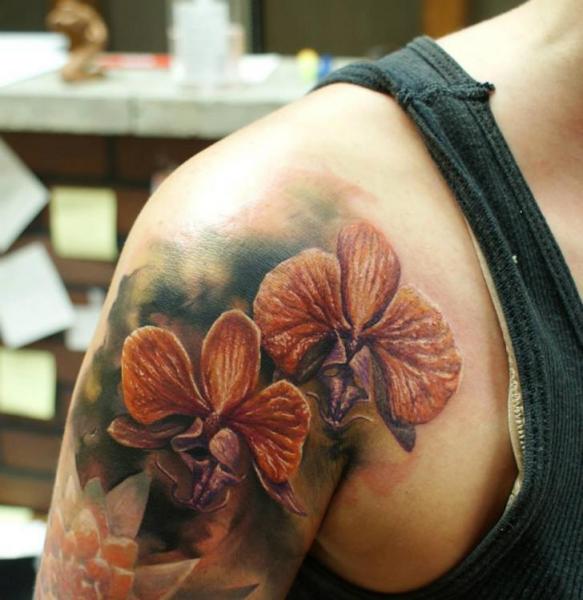 Shoulder Realistic Flowers tattoo by Bloodlines Gallery