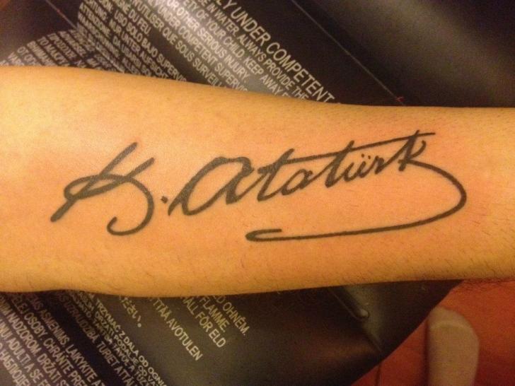 Signature Arm Lettering tattoo by Galata Tattoo
