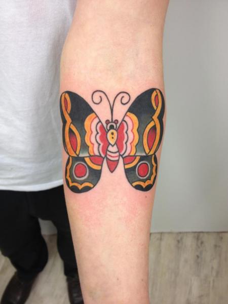 Simple Hand Old School Butterfly tattoo by Three Kings Tattoo
