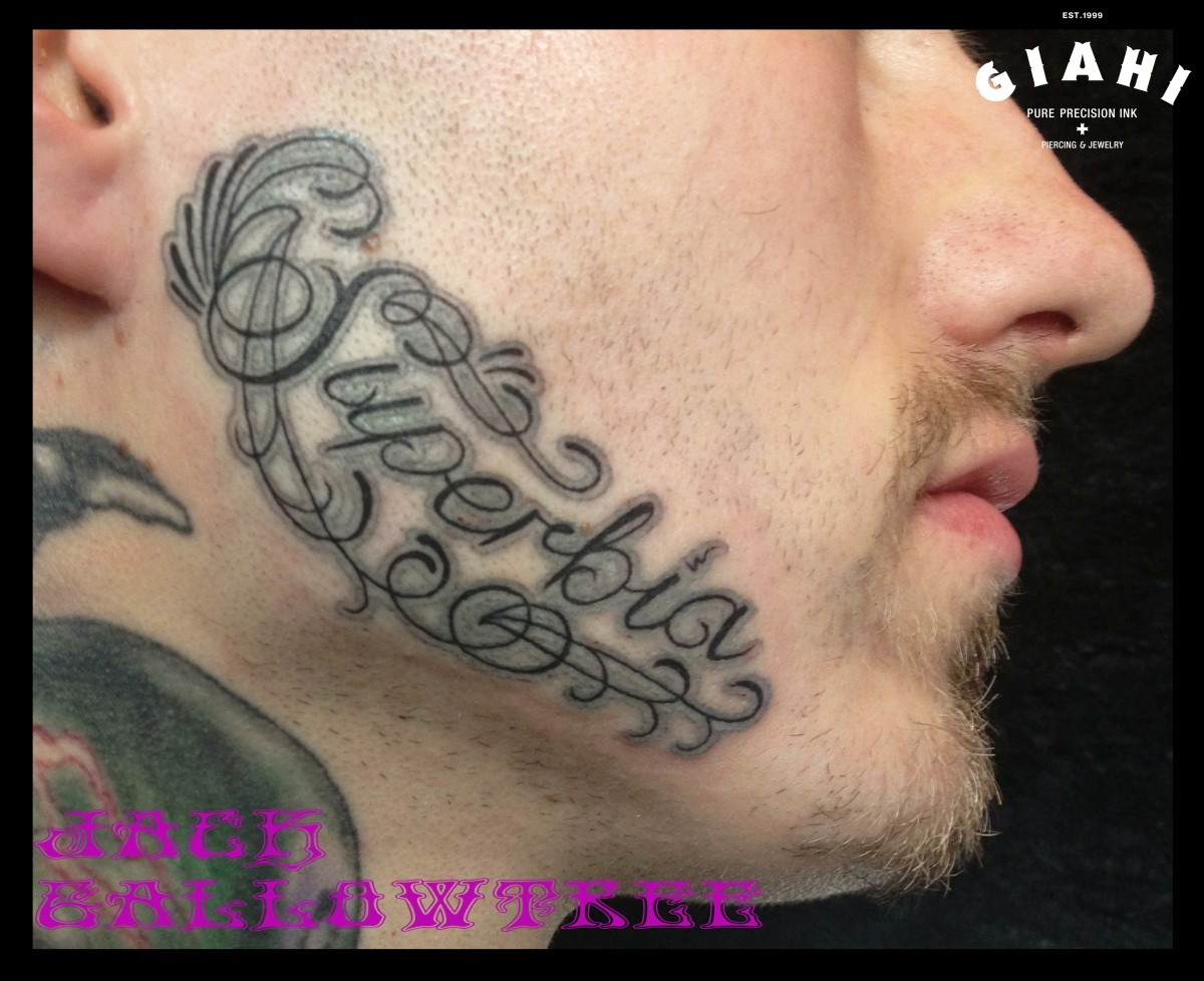 Superbia Lettering tattoo by Jack Gallowtree