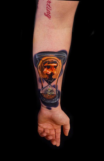 Symbolic Nuclear Hourglass tattoo by Andres Acosta