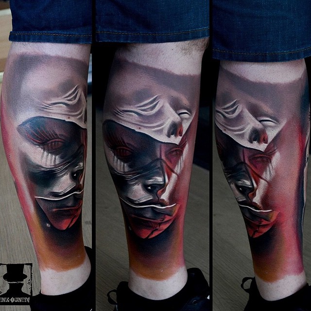 Abstract Faces Leg tattoo