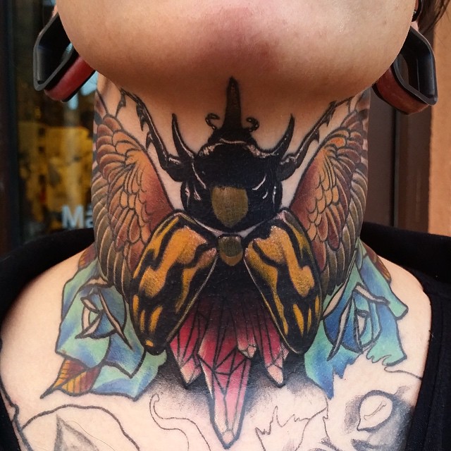 Bird Bug Neck tattoo