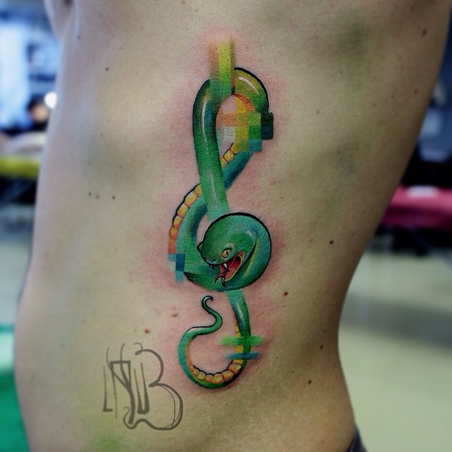 Pixel Snake Treble Clef tattoo