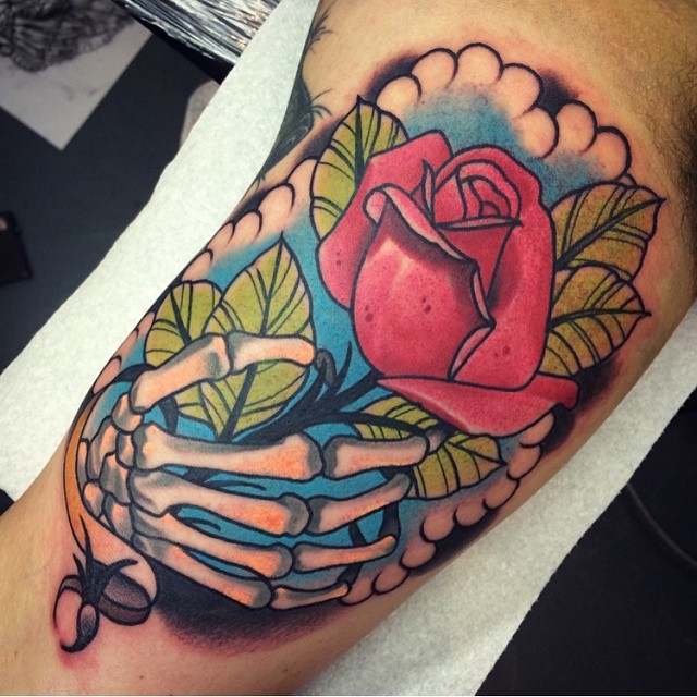 Rose in Skeleton Hand tattoo by Jack GOKS Pearce