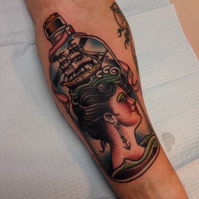 Girl and Ship in a Bottle Nautical tattoo