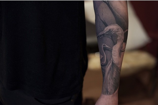 Graphic Realistic Crane Arm tattoo
