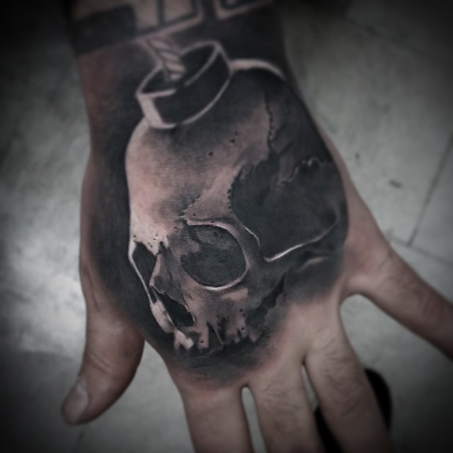 Graphic Skull Bomb Hand tattoo