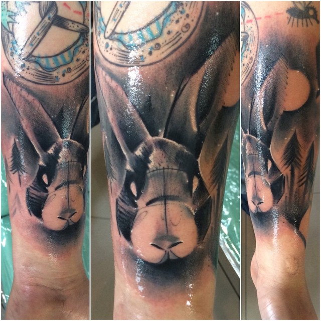 Grey Forest Rabbit tattoo on Arm