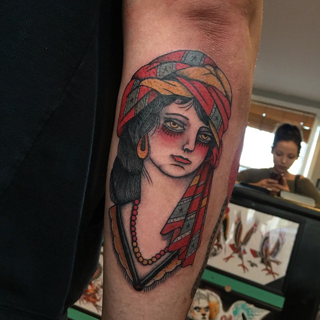 Sad Gipsy tattoo on Arm