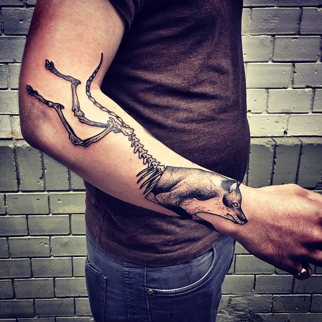 Skeleton Back Wolf Arm tattoo