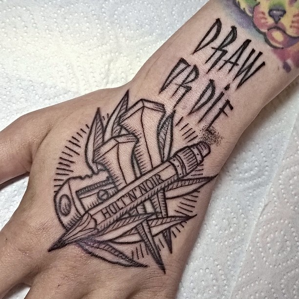 Draw or Die Hand Tattoo