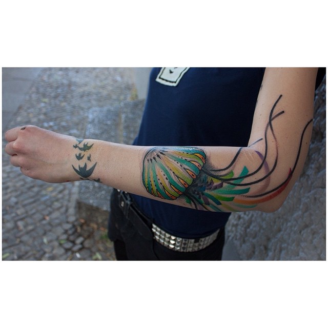 Green Jelly Fish Tattoo on Arm