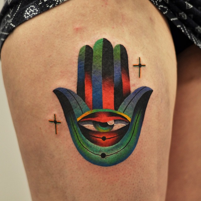Lily Hand Eye Tattoo