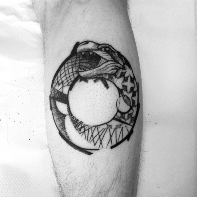 Round Snake Tattoo on Leg