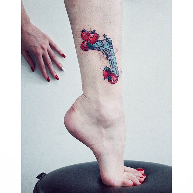 Strawberry Gun Tattoo on Leg