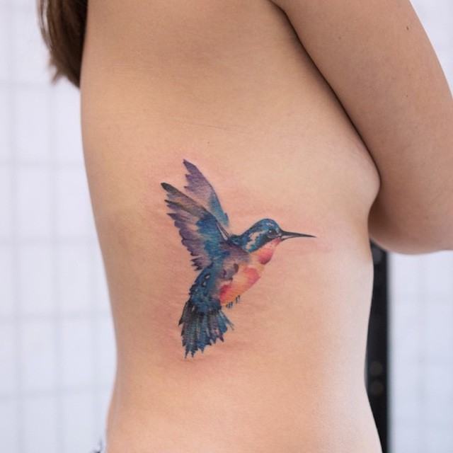 Watercolor Humming Bird Tattoo on Side