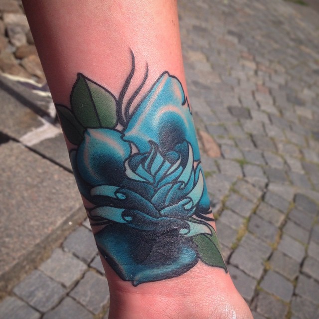 blue flower tattoo
