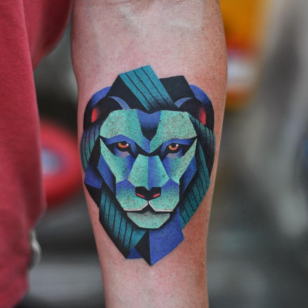 Blue Lion Tattoo on Arm