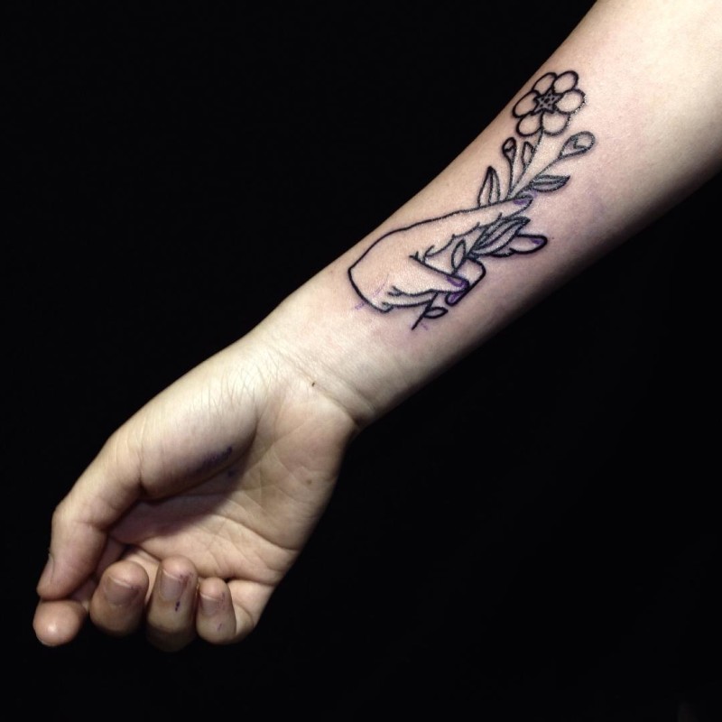 Hand With Flower Tattoo on Wrist