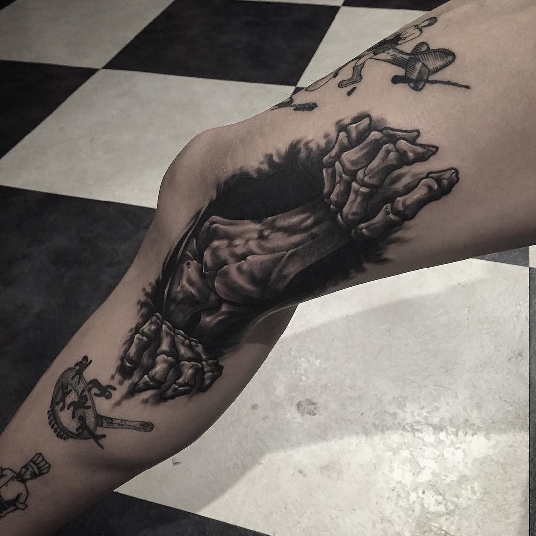 Skeleton Hands Leg Tattoo