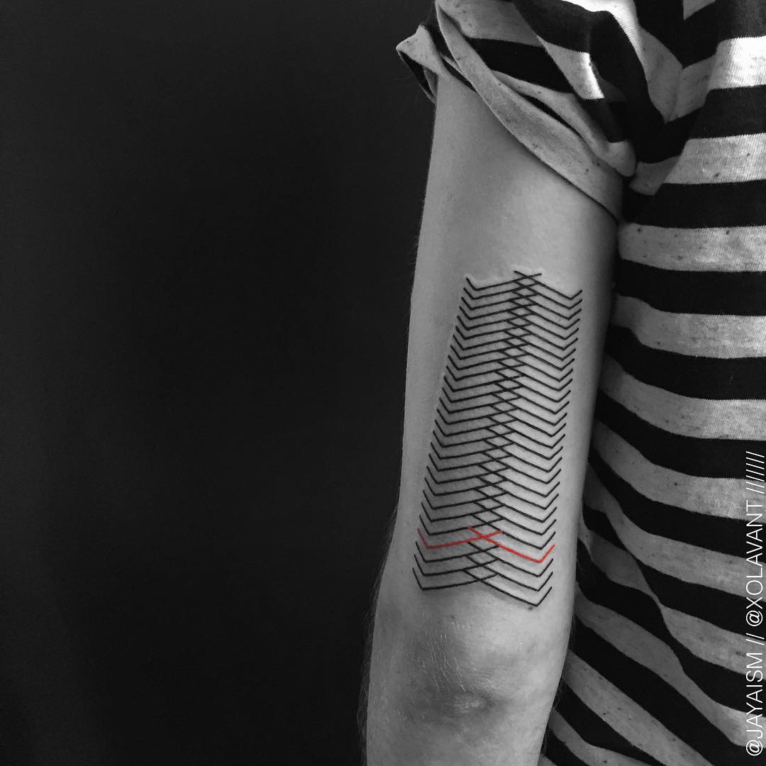 A lot of Crossed Lines Tattoo