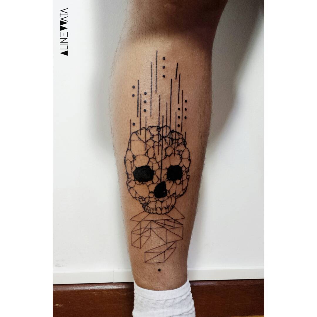 Falling Skull Tattoo on Calf
