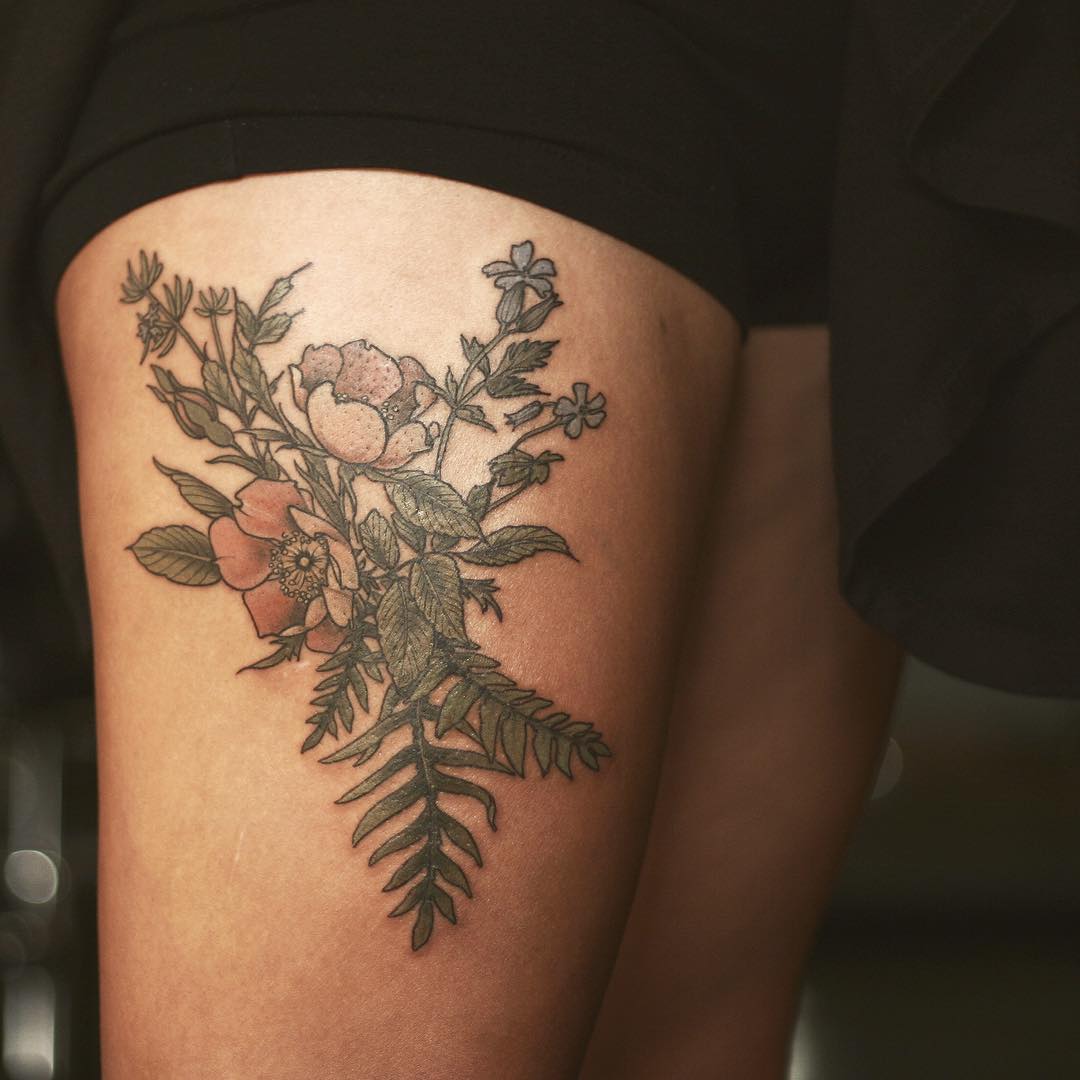 Flowers on Thigh Tattoo