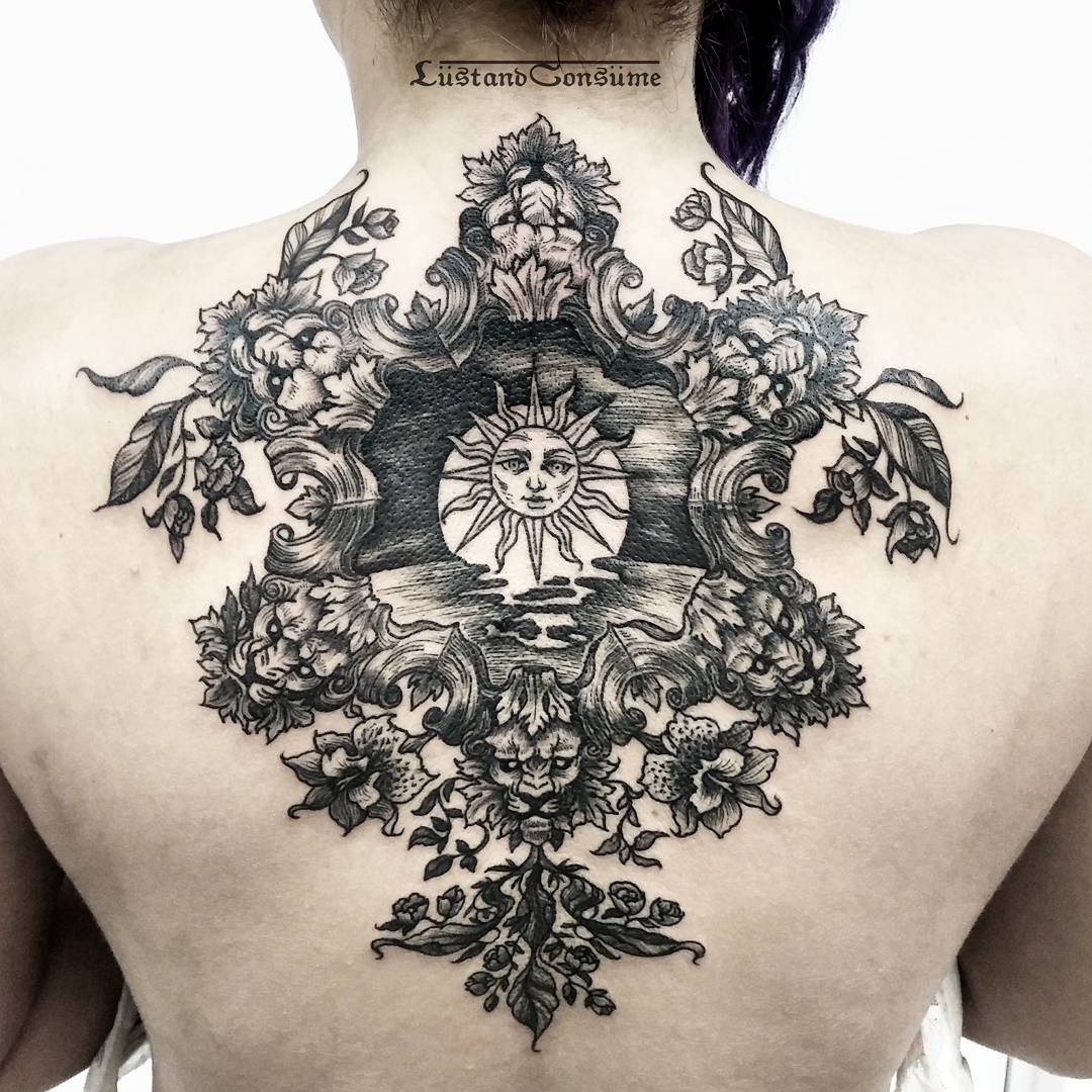 Sun Tattoo on Back