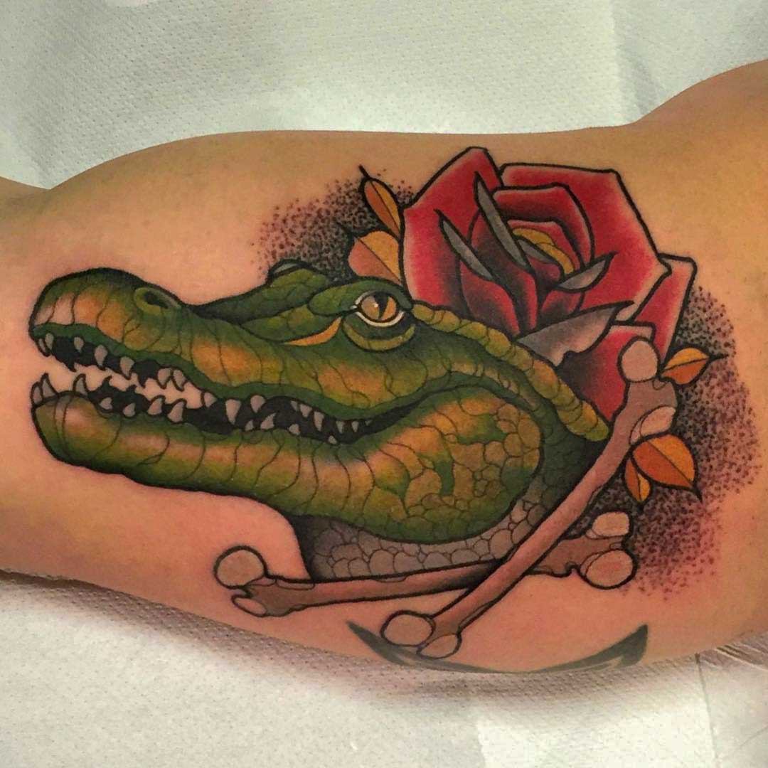 Crocodile tattoo on bicep