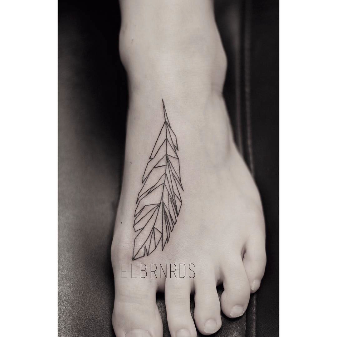 geometrical feather tattoo on foot