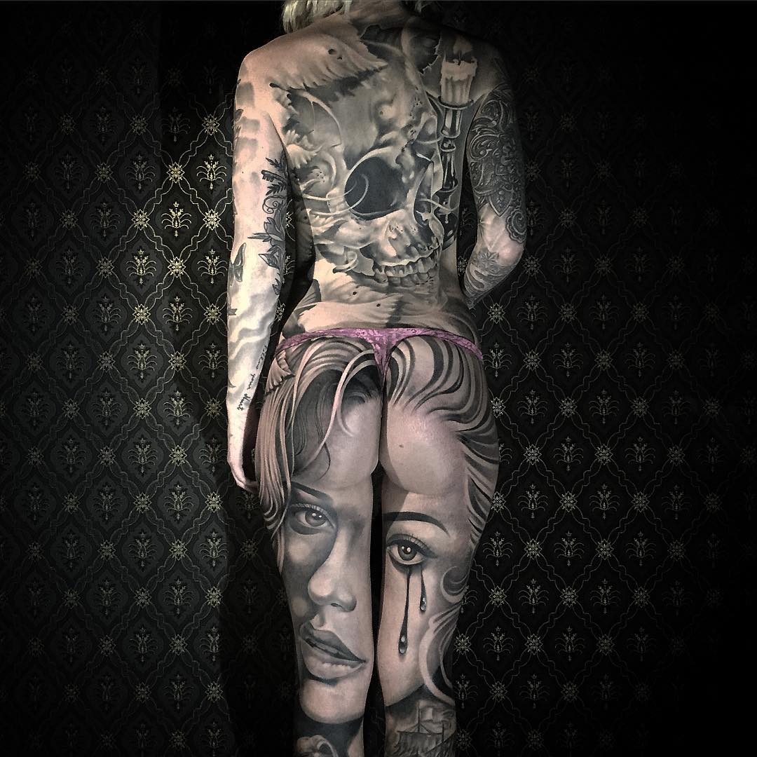 an awesome full body tattooed girl