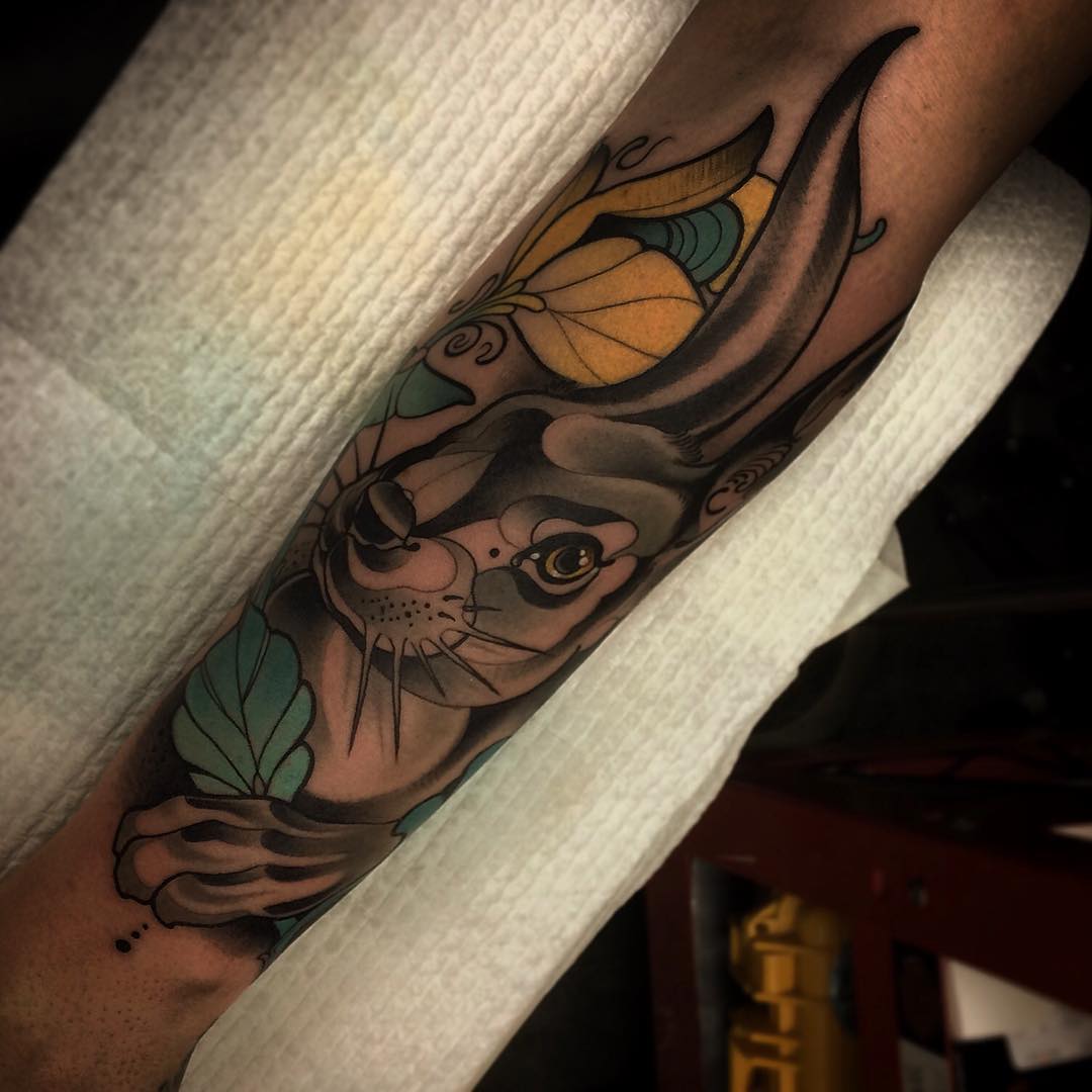 neo-traditional hare tattoo on arm