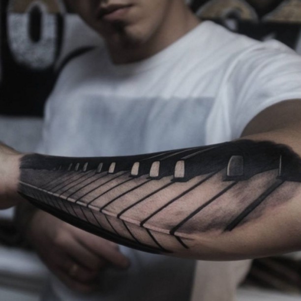 the whole piano keyboard tattoo done in prospective