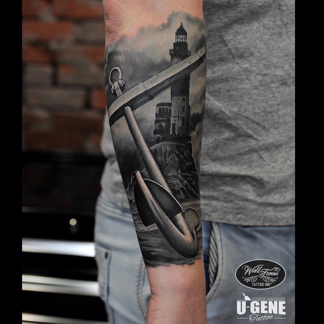 a black and grey tattoo of an anchor on the beacon background