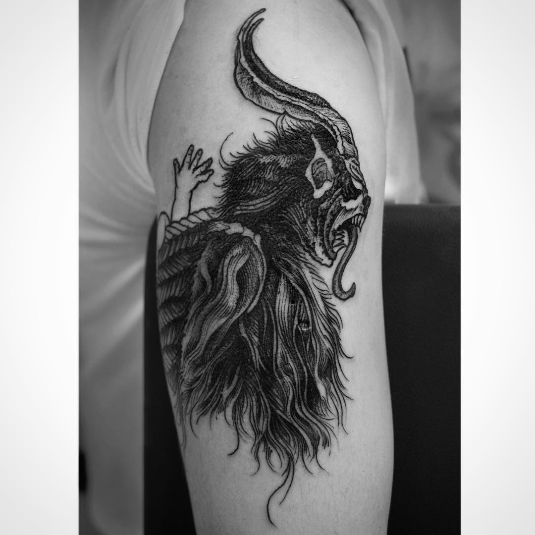 tattoo demon on shoulder