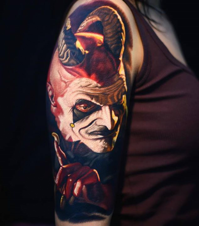 demon or satyr tattoo on shoulder