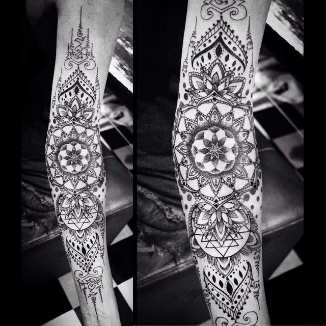 mandalas pattern tattoo on arm