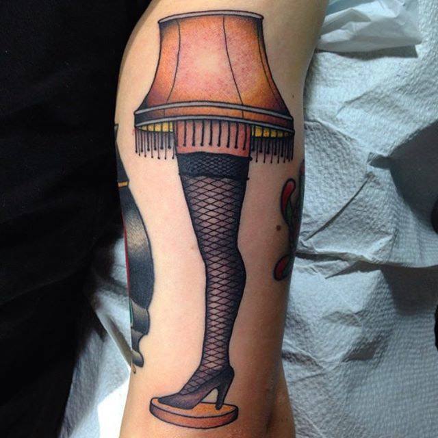girl legs lamp tattoo