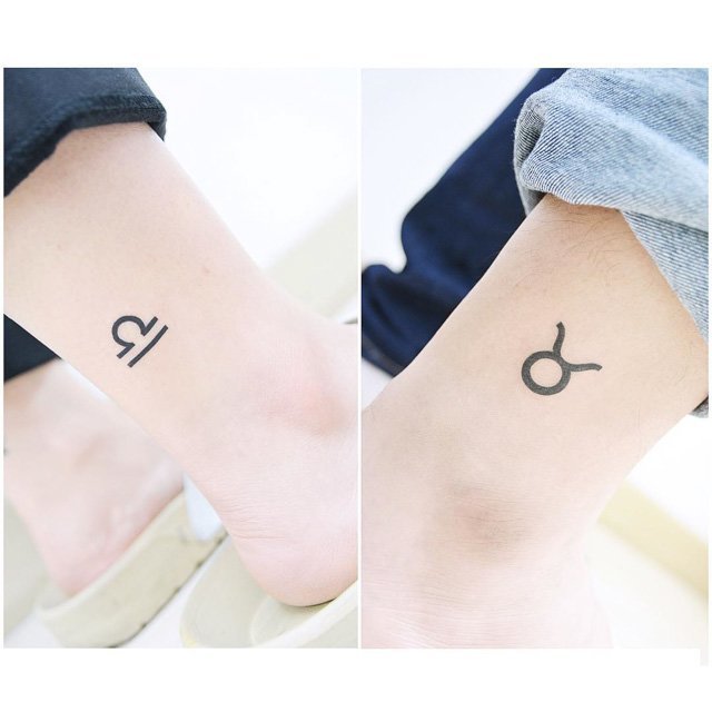 two tattoos of two horoscope signs