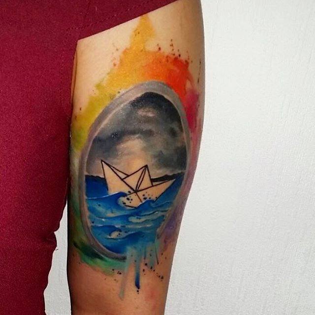 arm tattoo paper ship
