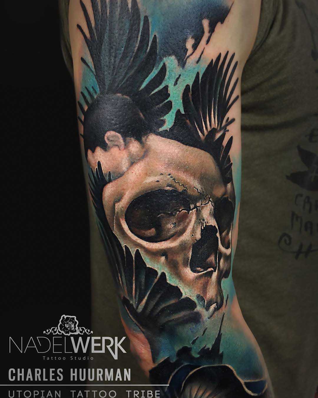 abstract skull tattoo on upper arm